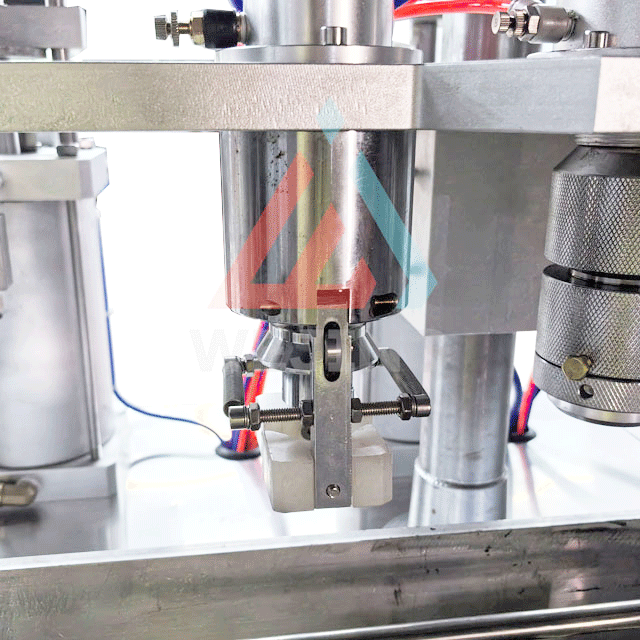 エアゾール充填機の直立システム